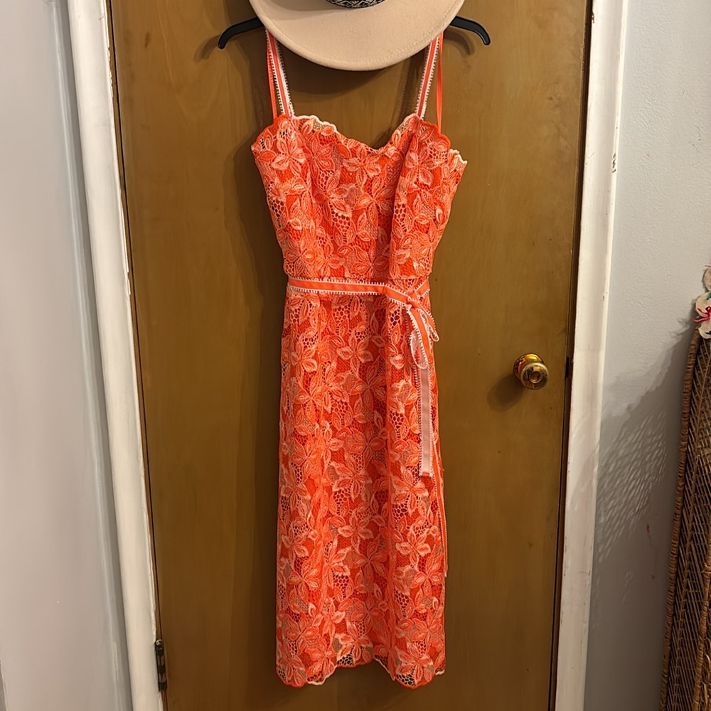 Vibrant orange lace overlay dress